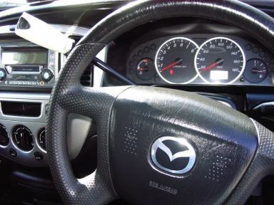 Mazda Tribute 2002   |   30.03.2009.