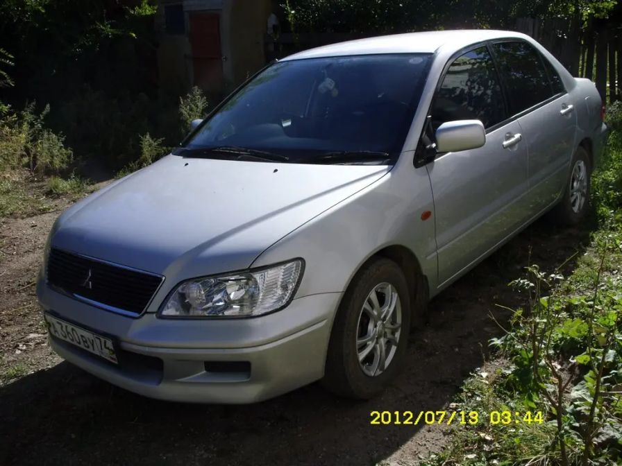 Фото mitsubishi lancer 2006 год черный цвет