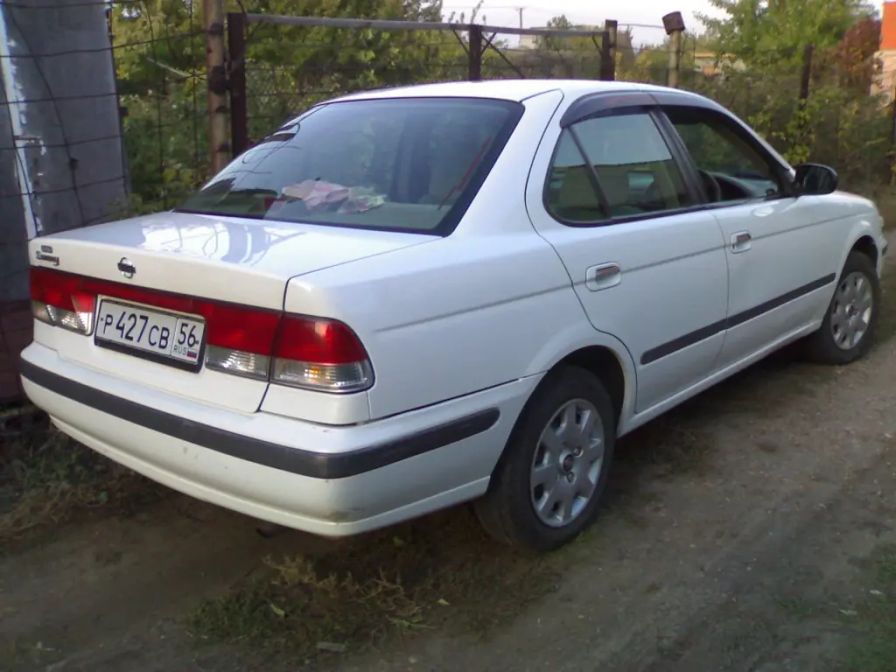 2000 15 год. Nissan Sunny 2000. Кузов Ниссан Санни 2000. Ниссан Санни 2000 драй 2. Ниссан Санни хетчбек2000.