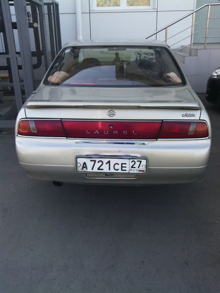 1994 отзывы. Nissan Laurel 1994. Ниссан Лаурель 1994. Nissan Laurel c34 сзади. Лаурель медалист 1994.