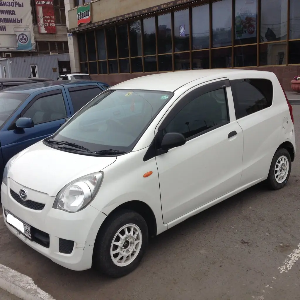 Daihatsu mira 2009 год